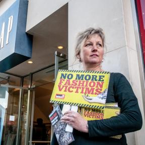 Protesters holding placards saying 'No More Fashion Victims' outside the Gap clothing store in Exeter to highlight Gap’s refusal to sign the Saftey Accordthat would improve conditions for garment factory workers. Photo: (C) Clive_Chilvers