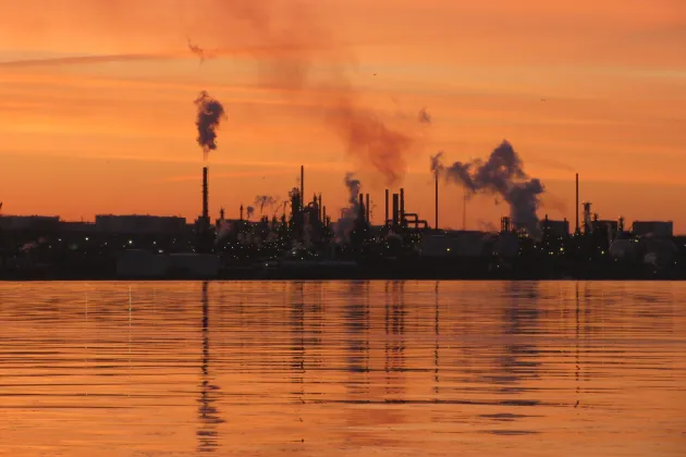 Oil Refinery at Dawn by Iguanasan is licensed under CC BY-NC-ND 2.0