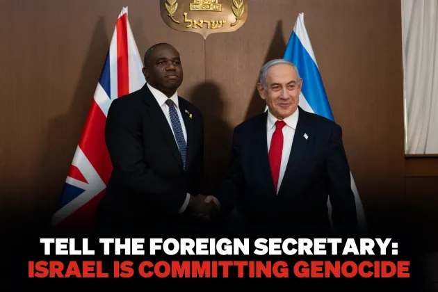 David Lammy, UK Foreign Secretary, shakes hands with Benjamin Netanyahu, Israel's Prime Minister.