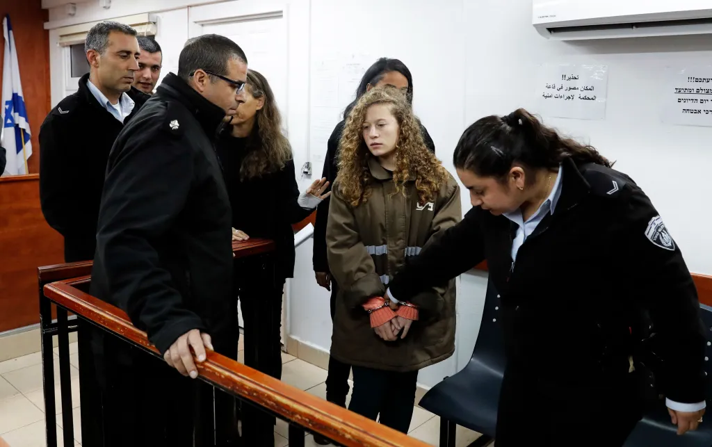 Sixteen-year-old Ahed Tamimi arrives for a hearing at Ofer military court. Photo: Photo: Ahmad Gharabli/AFP