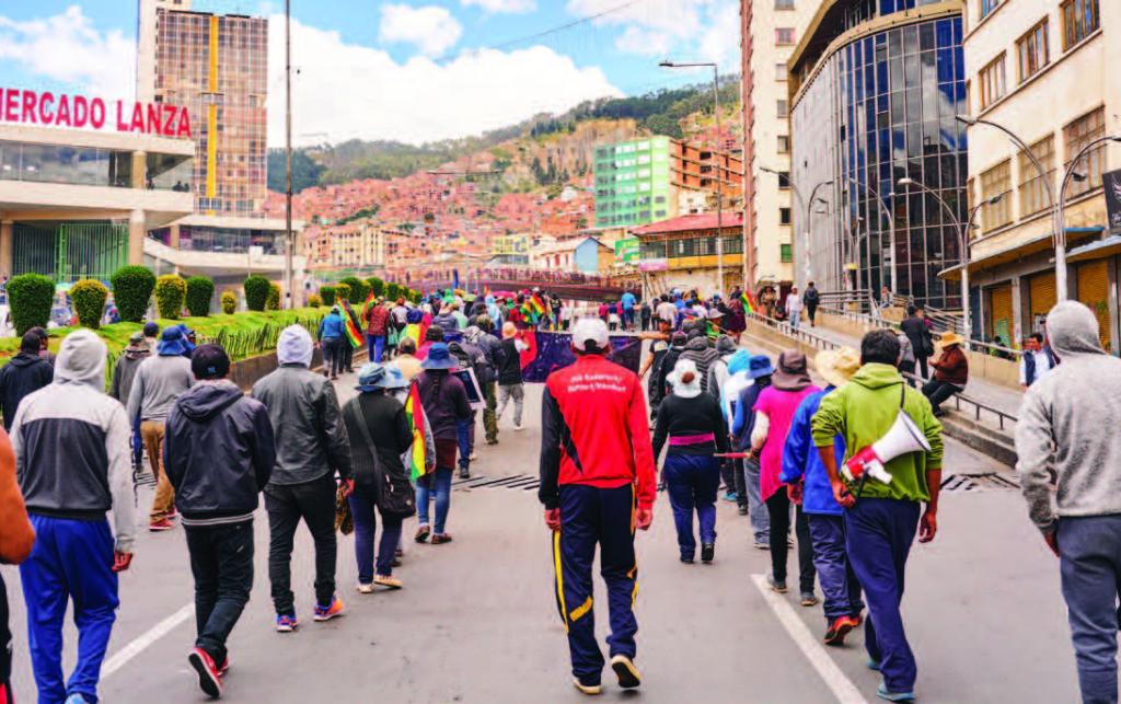 Indigenous miners in Bolivia demonstrate in the capital city of La Paz in 2019.