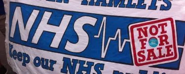 A banner at a demonstration that reads: "Tower Hamlets – NHS Not for sale: Keep our NHS public"