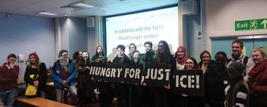 Students at a King's College London event hold a banner that reads "Hungry for justice". Credit: KCL Action Palestine.
