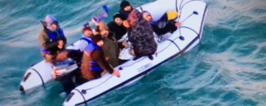 People in a small dinghy in the Channel. Photo: Marine Nationale