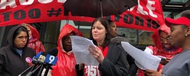 Christine speaking outside McDonald’s HQ in Chicago.