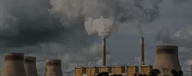 A power station emitting fumes.