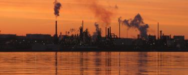 Oil Refinery at Dawn by Iguanasan is licensed under CC BY-NC-ND 2.0