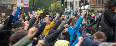 Anti racism hands raised protest