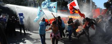 7 October 2009. Istanbul / Turkey. Police and activists clash in IMF protests in Istanbul
