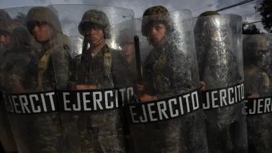 A row of Honduran military holding riot shields during 2017 elections. Photo: Sean Hawkey