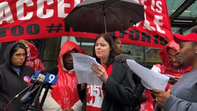 Christine speaking outside McDonald’s HQ in Chicago.